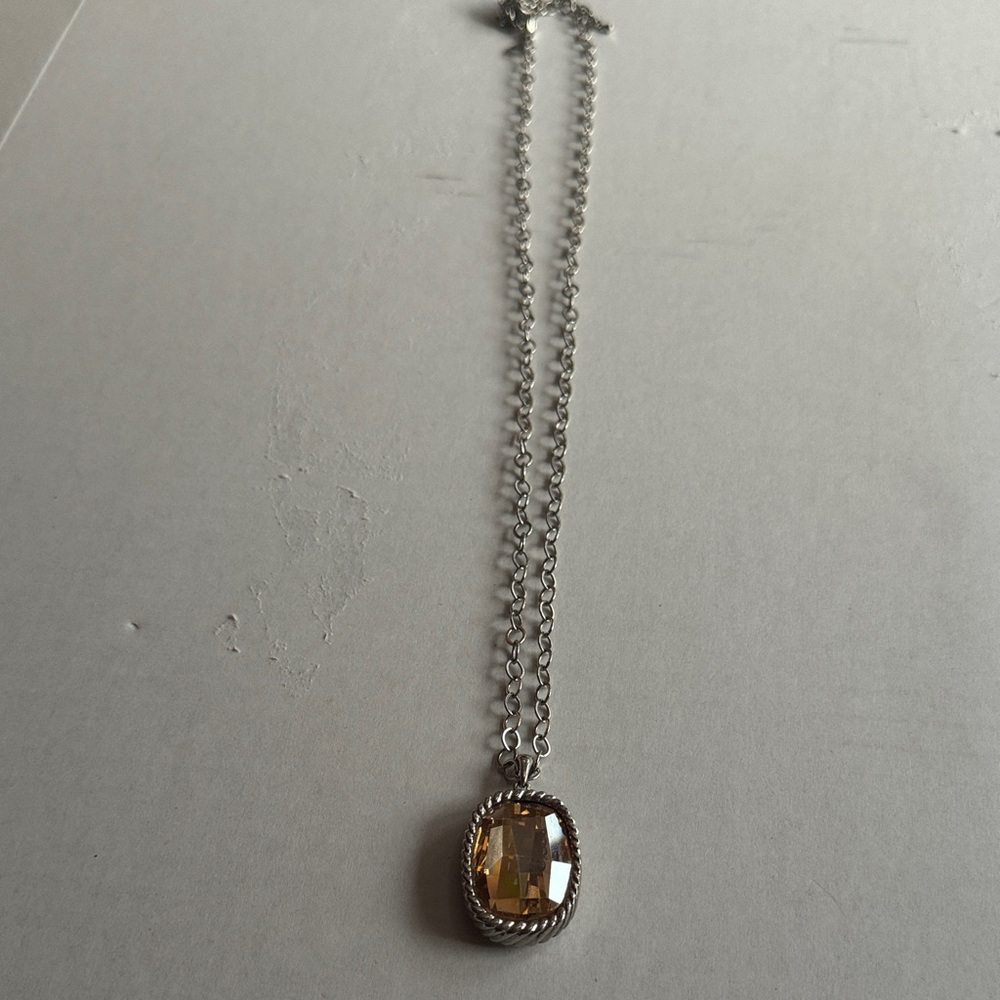 Elegant Silver Necklace with Yellow Gemstone 
Total Length of chain is 34in